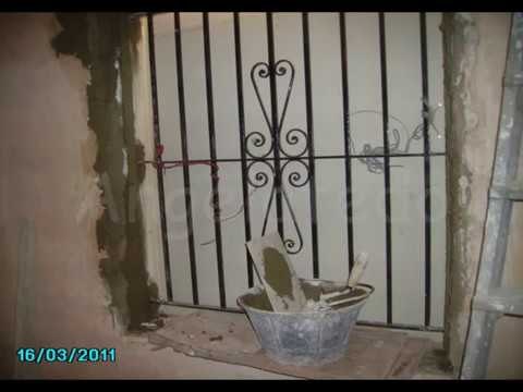 Colocación de ventana de aluminio, y reja de hierro
