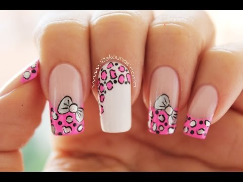 Uñas animal print y moño