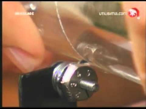 Haciendo floreros con cortabotellas 