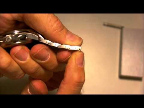 Como ajustar pulsera de titanio de reloj 