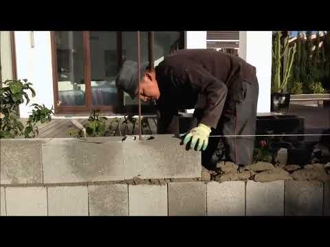 Construcción de muro de bloque de hormigón