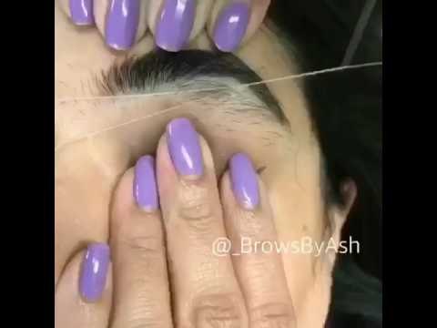 Depilarse las cejas con hilo